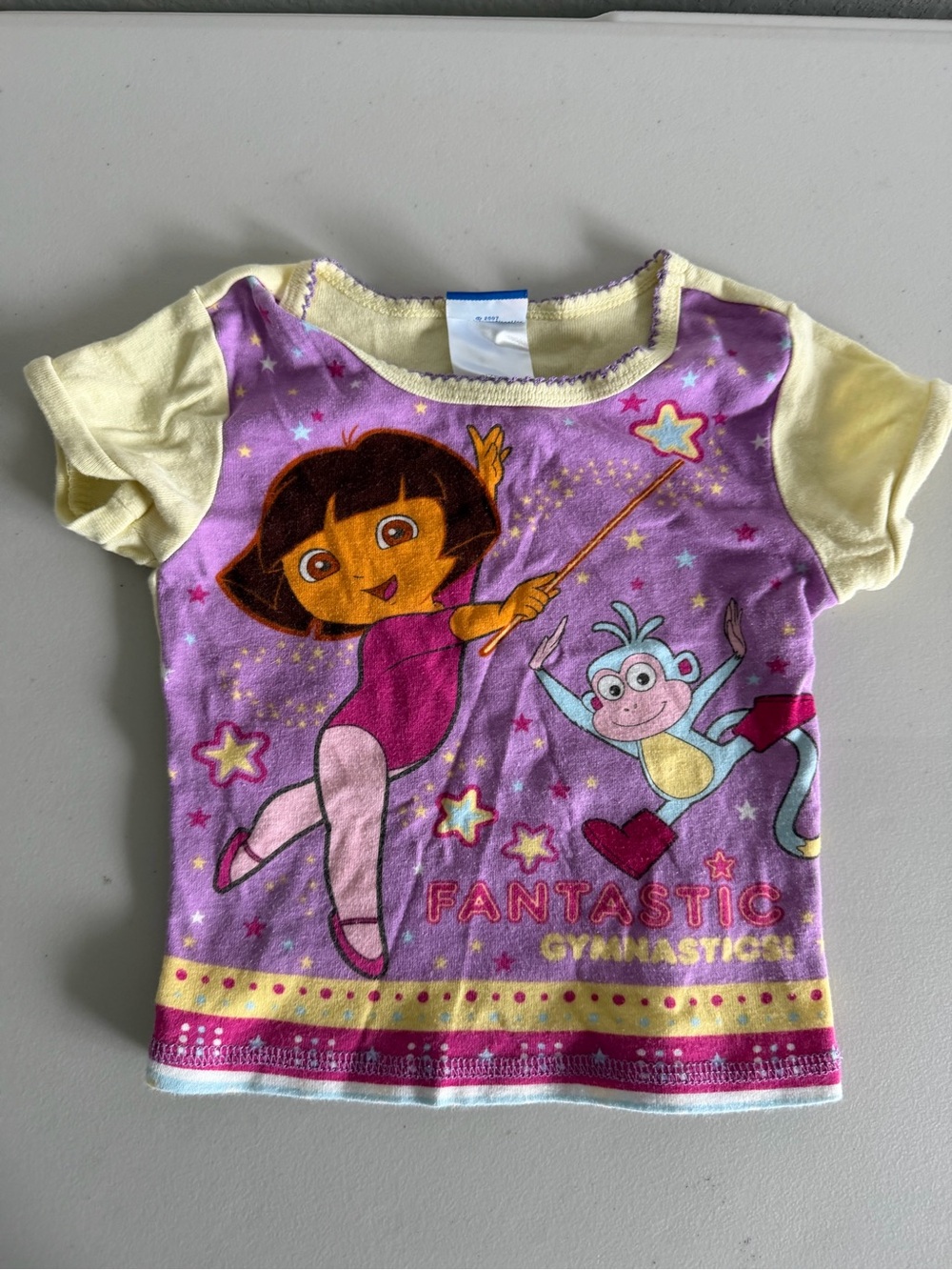 Vintage Y2K Dora the Explorer Purple & Yellow Gymnastics Tee for Kids